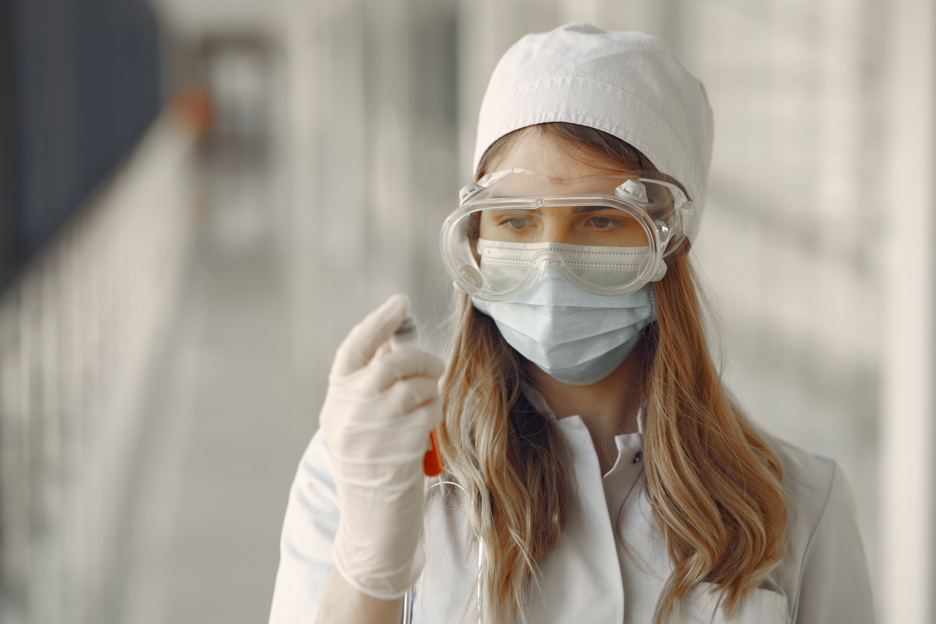 woman-in-white-long-sleeve-shirt-wearing-white-goggles-3985155